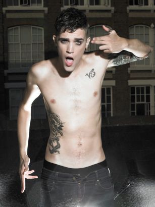 Josh Beech Arm And Side Stomach Tattoo